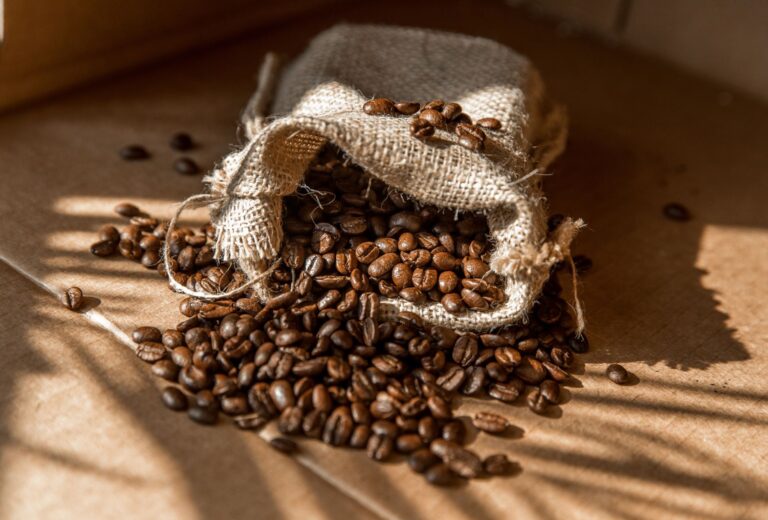 A bag of coffee beans spilled